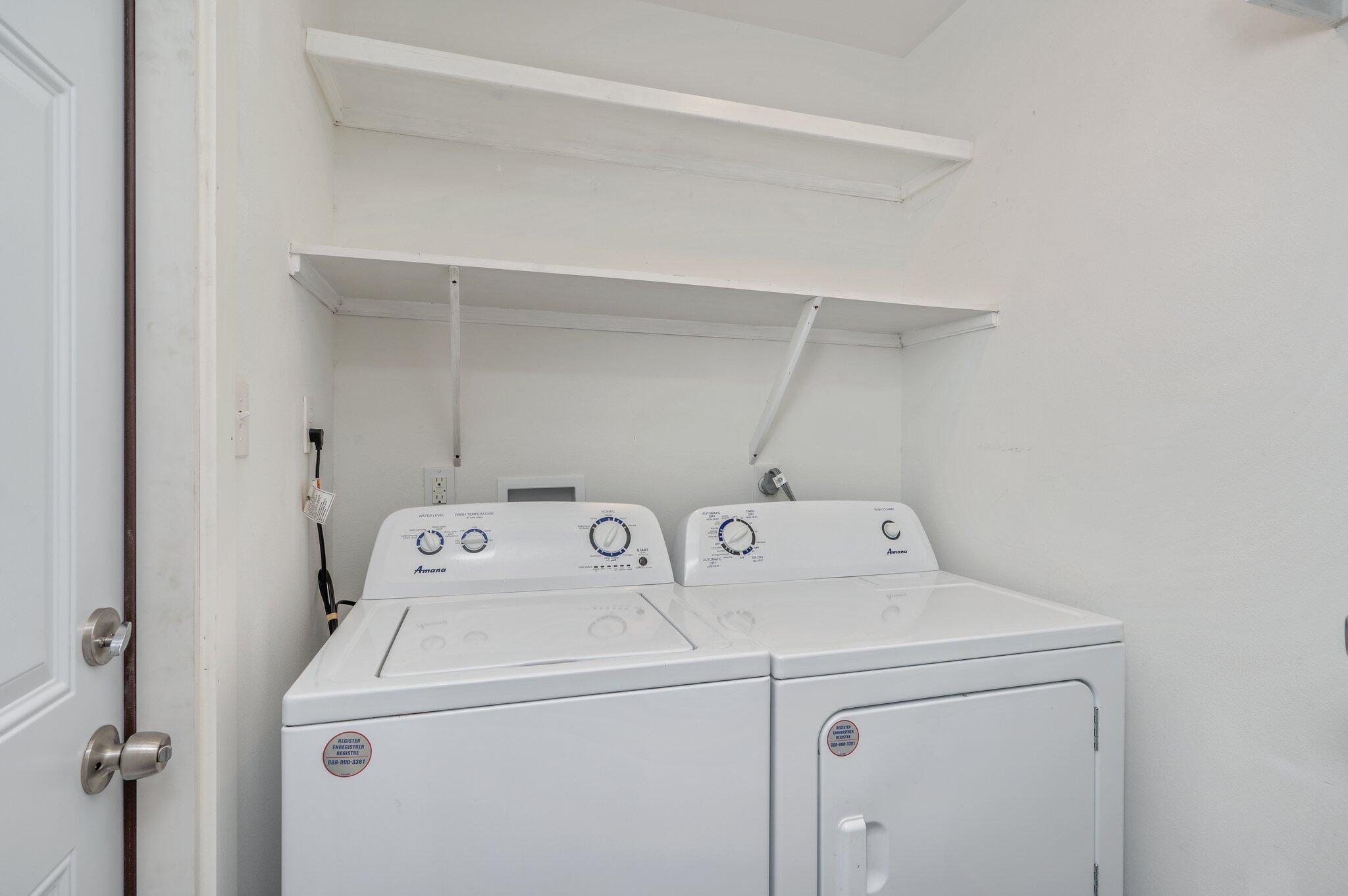 710 Legion Drive Destin, FL 32541 - Photo 16 of 29 a utility room with dryer and washer