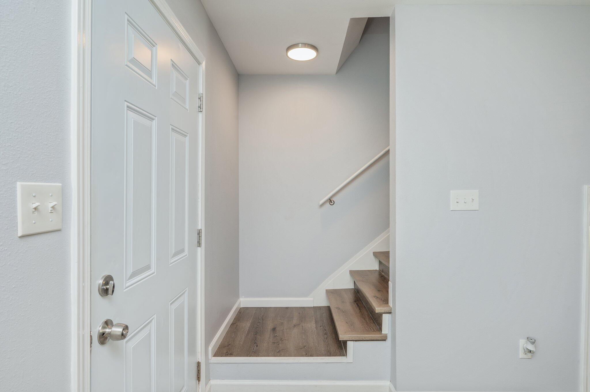 710 Legion Drive Destin, FL 32541 - Photo 17 of 29 a view of an entryway with staircase