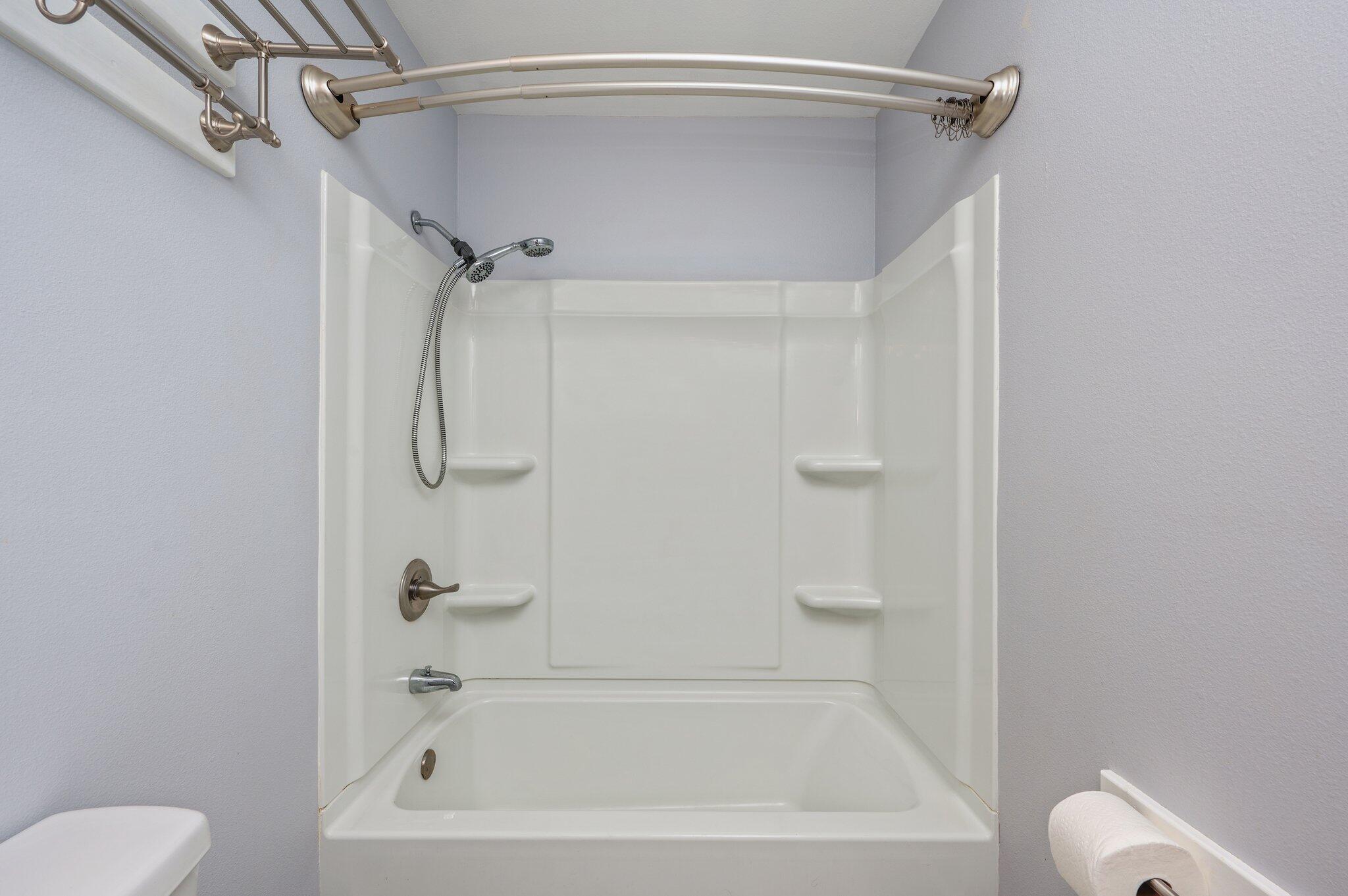 710 Legion Drive Destin, FL 32541 - Photo 23 of 29 a bathroom with a shower and a toilet