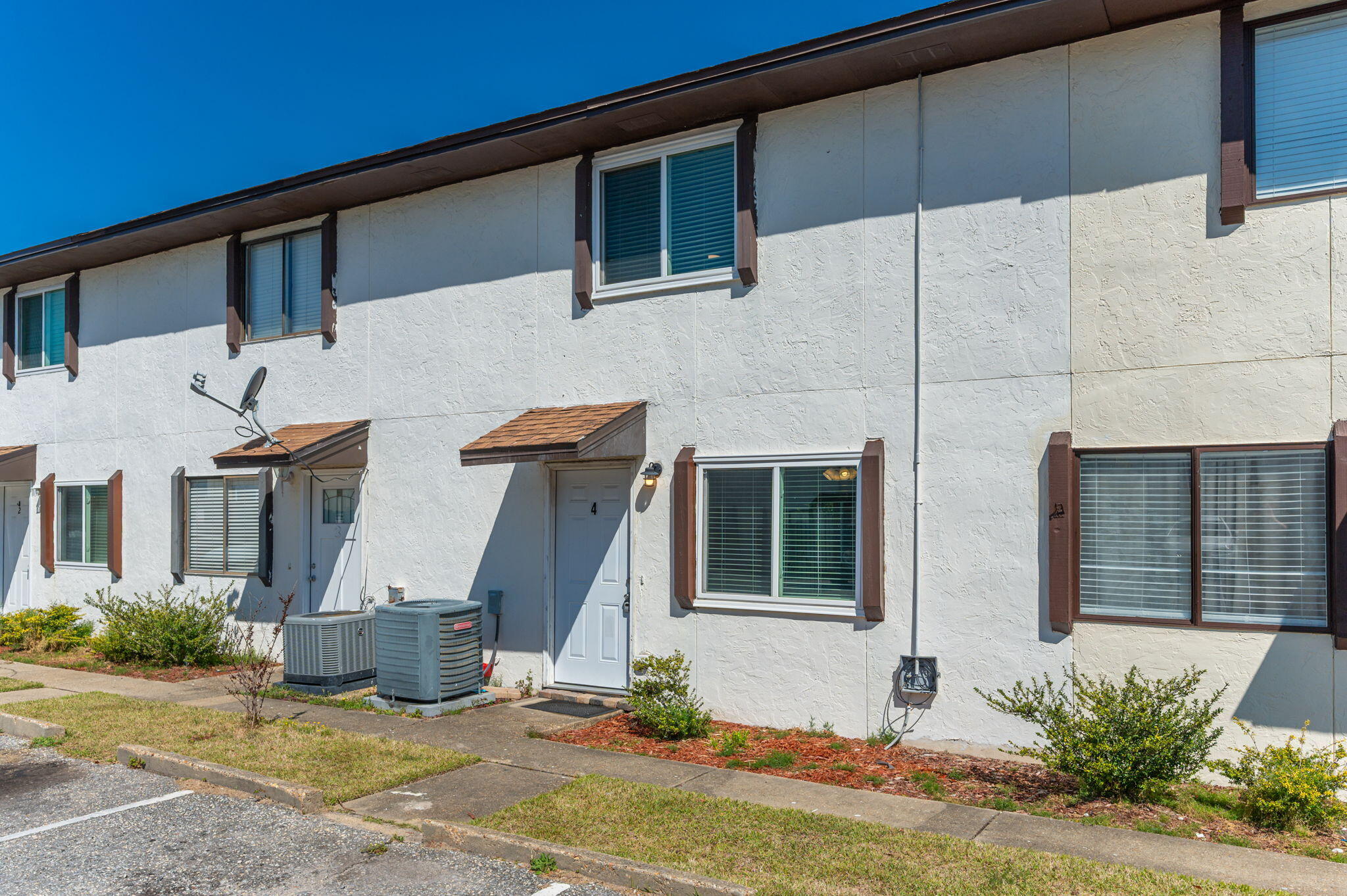 710 Legion Drive Destin, FL 32541 - Photo 4 of 29 a front view of a house with a yard