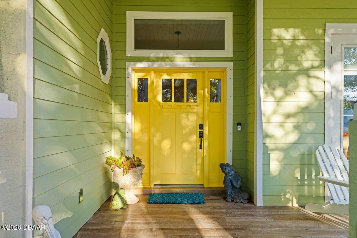 4767 Riverglen Boulevard Ponce Inlet, FL 32127 - Photo 13 of 60 a view of a door of the house