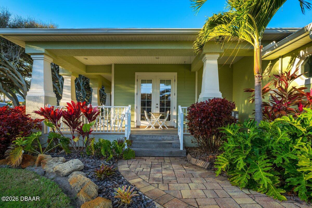4767 Riverglen Boulevard Ponce Inlet, FL 32127 - Photo 18 of 60 a front view of a house