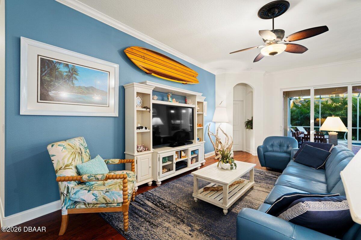 4767 Riverglen Boulevard Ponce Inlet, FL 32127 - Photo 39 of 60 a living room with furniture and a flat screen tv