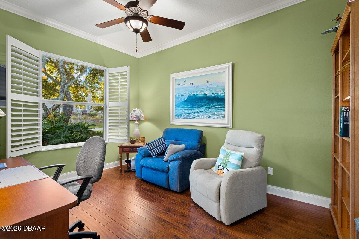 4767 Riverglen Boulevard Ponce Inlet, FL 32127 - Photo 41 of 60 a living room with furniture and a window