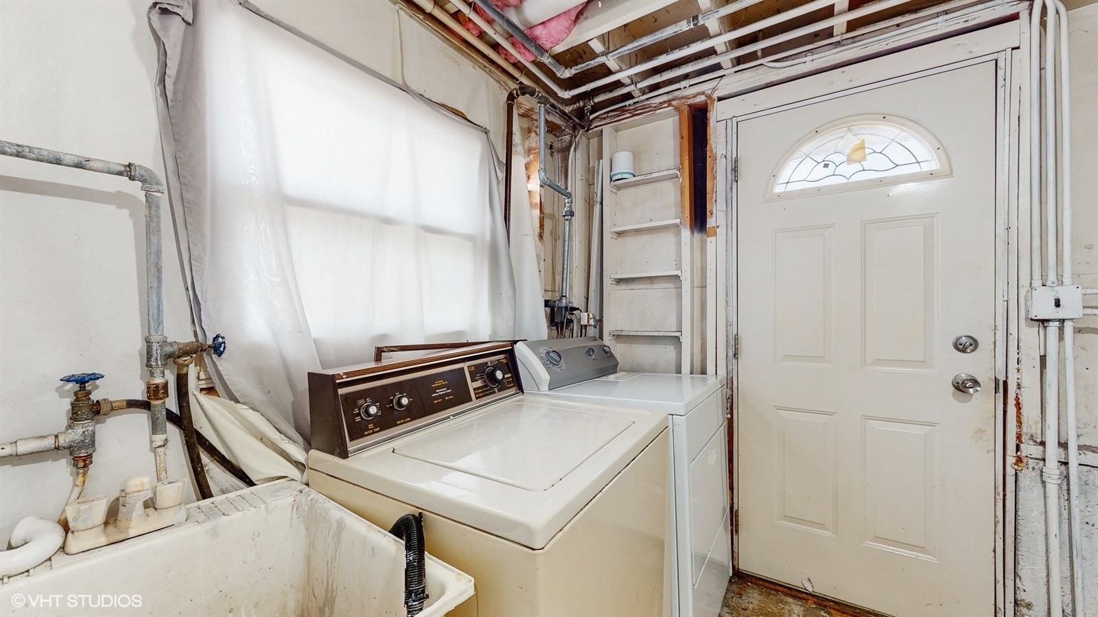 7700 Maple Street Morton Grove, IL 60053 - Photo 20 of 43 a bathroom with a sink and a mirror