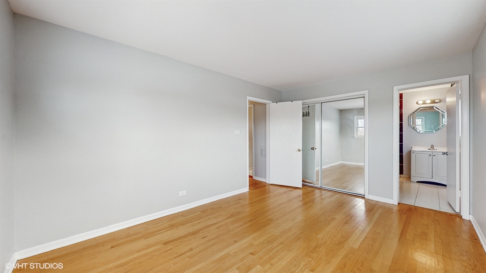 7700 Maple Street Morton Grove, IL 60053 - Photo 22 of 43 a view of an empty room and window