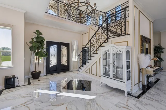 a view of entryway and hall with a window