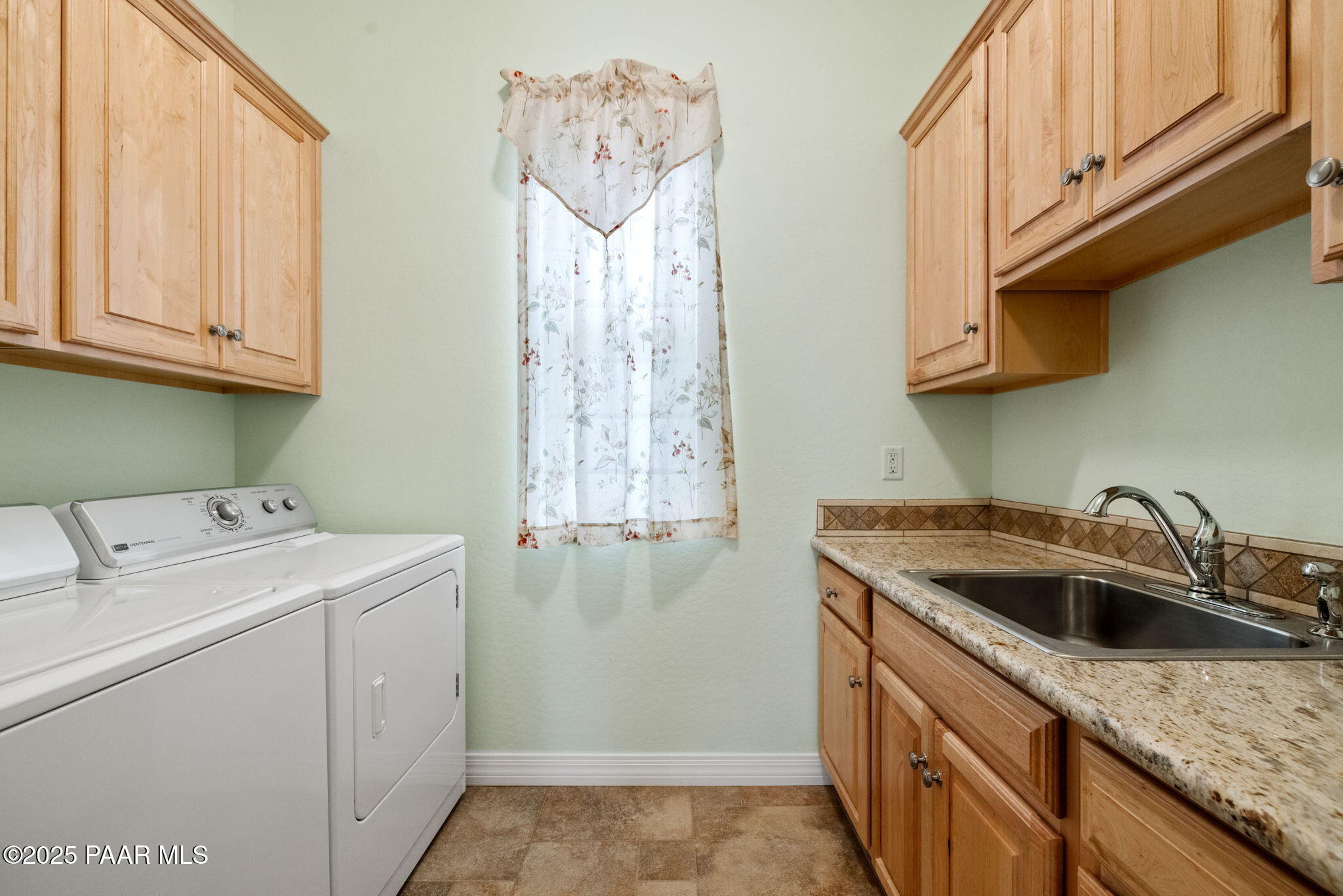 5370 North Skyhawk Road Chino Valley, AZ 86323 - Photo 22 of 25 a utility room with dryer and washer