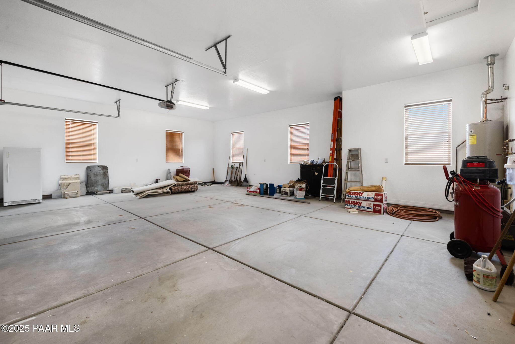 5370 North Skyhawk Road Chino Valley, AZ 86323 - Photo 23 of 25 a view of a room with gym equipment and windows