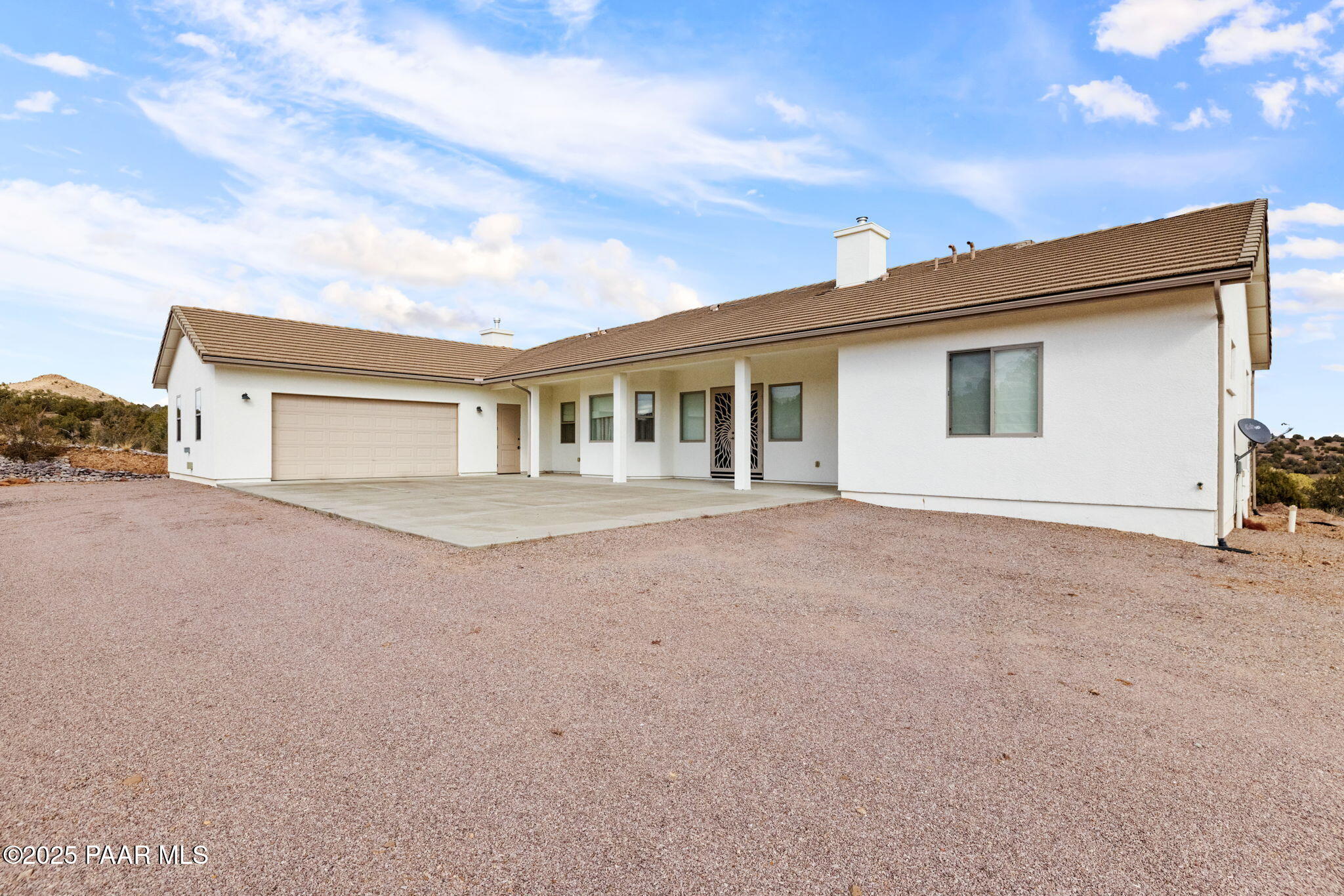 5370 North Skyhawk Road Chino Valley, AZ 86323 - Photo 24 of 25 a view of house with yard and garage