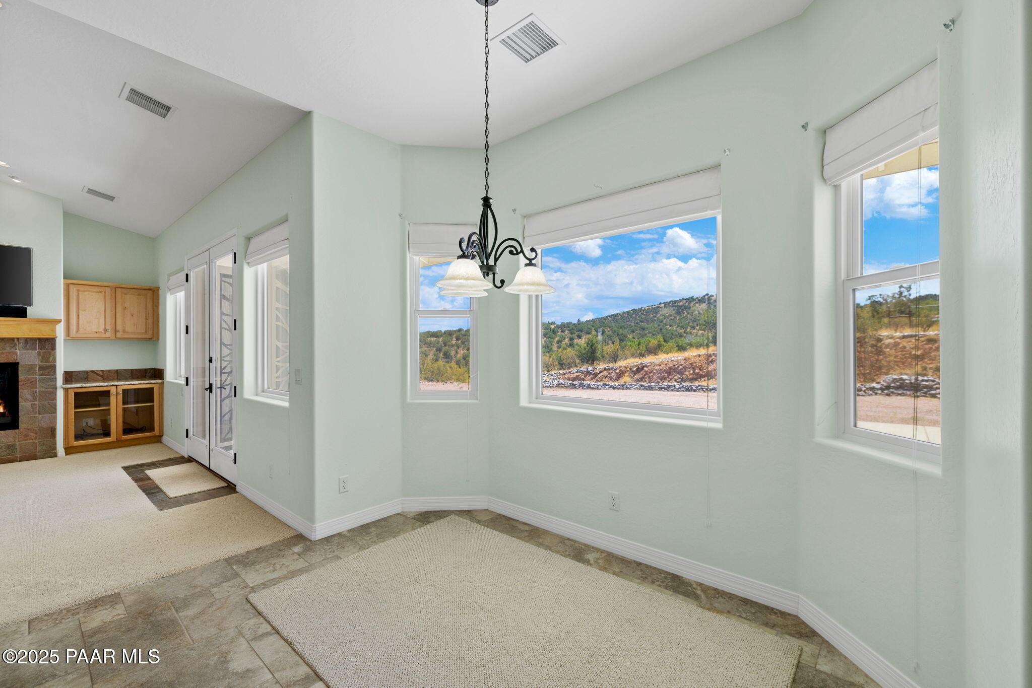 5370 North Skyhawk Road Chino Valley, AZ 86323 - Photo 8 of 25 a view of an empty room with a window