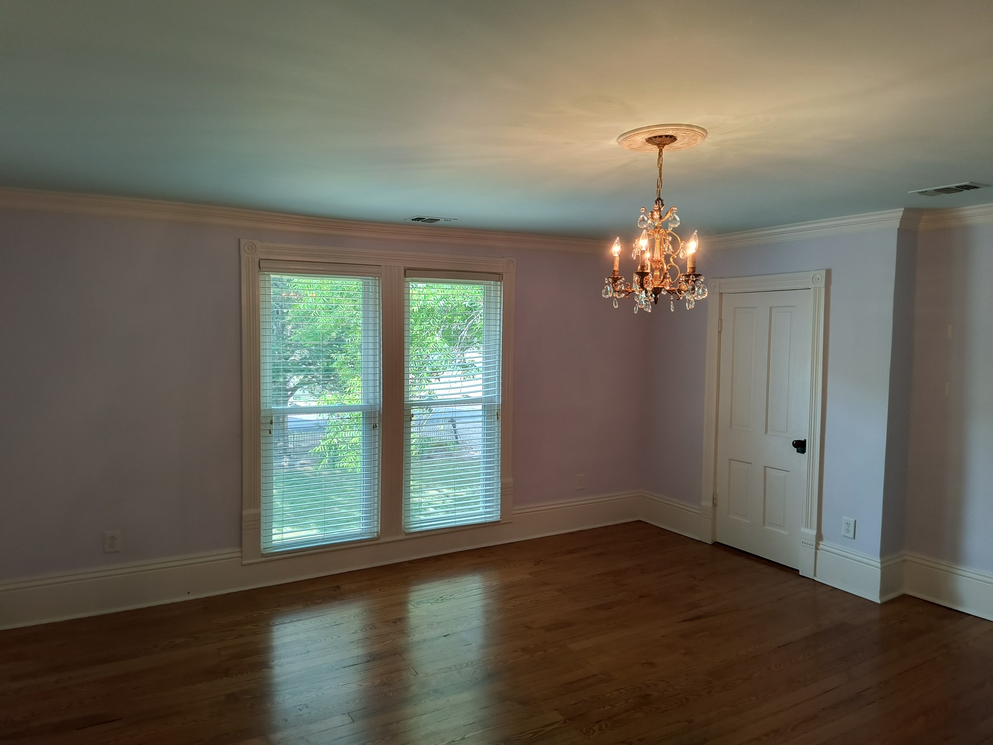 3460 Big Springs Road Lebanon, TN 37090 - Photo 45 of 74 a view of a chandelier in big room with wooden floor chandelier and closet