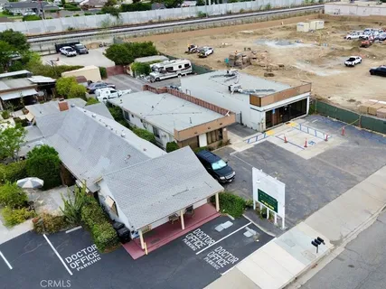 an aerial view of a house with a garden