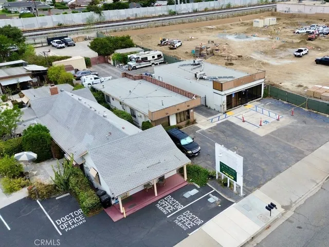 an aerial view of a house with a garden
