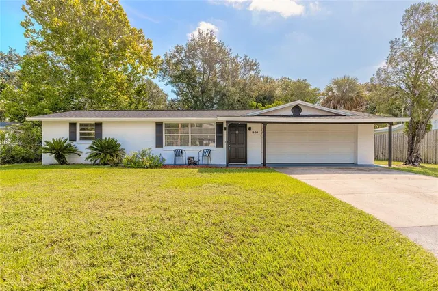 a front view of a house with swimming pool