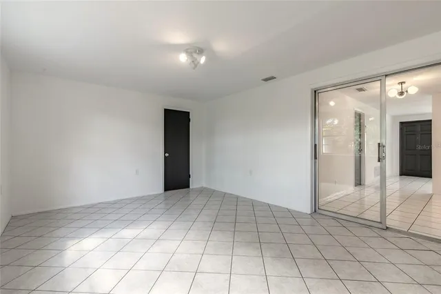 a view of staircase with white walls