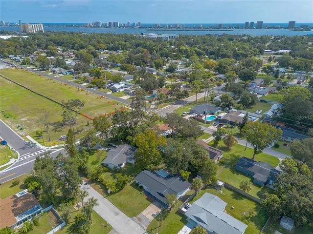 a backyard of a house with lots of green space