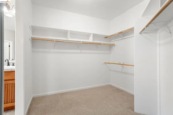 a view of an empty walk in closet