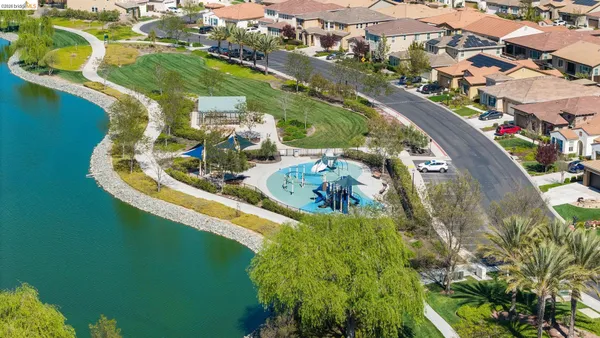 an aerial view of a house with a ocean view