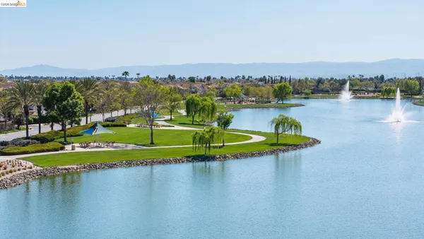 a view of a lake with a city
