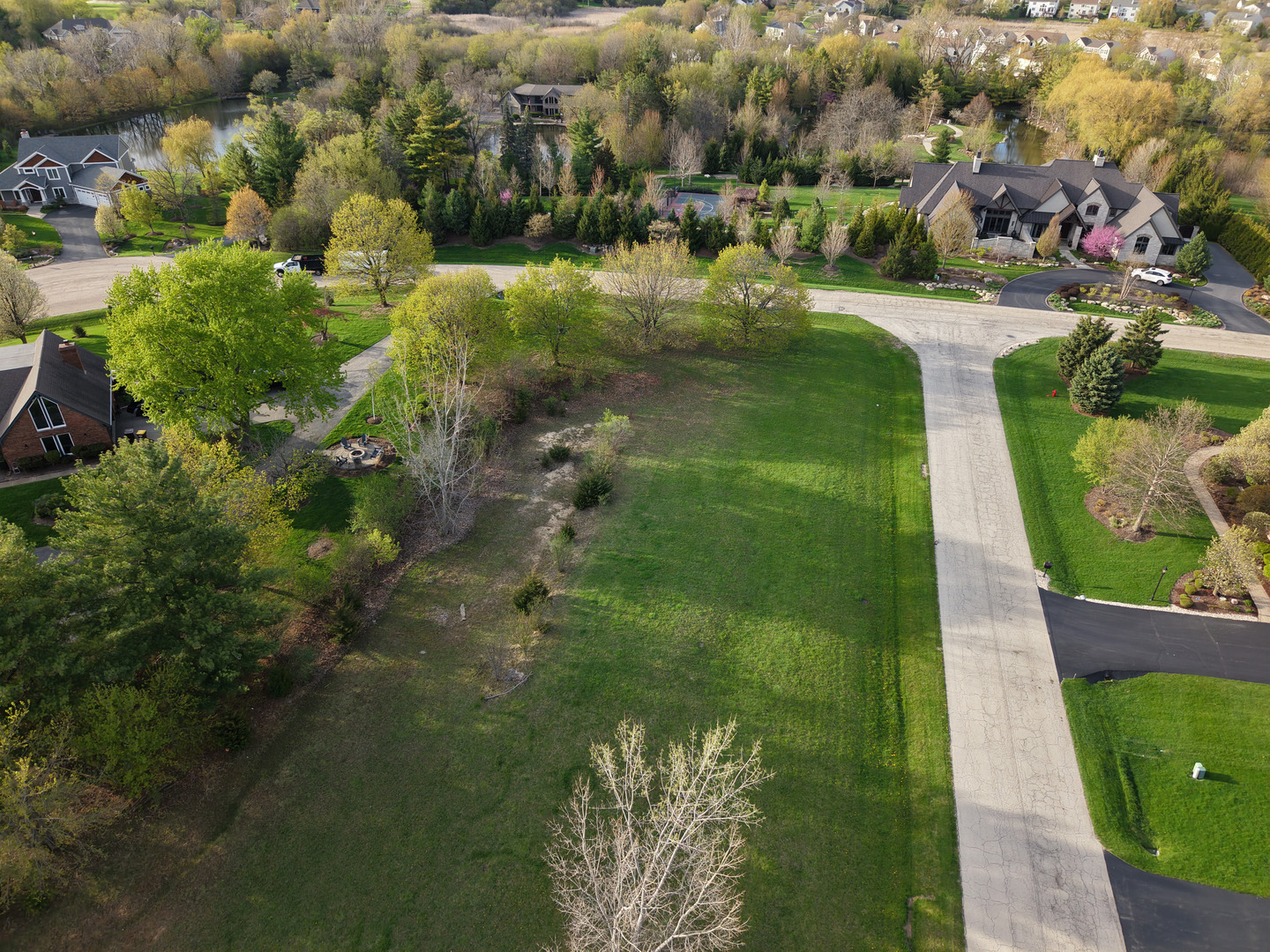8875 Belfield Road Lakewood, IL 60014 - Photo 7 of 15 a view of a lake with houses