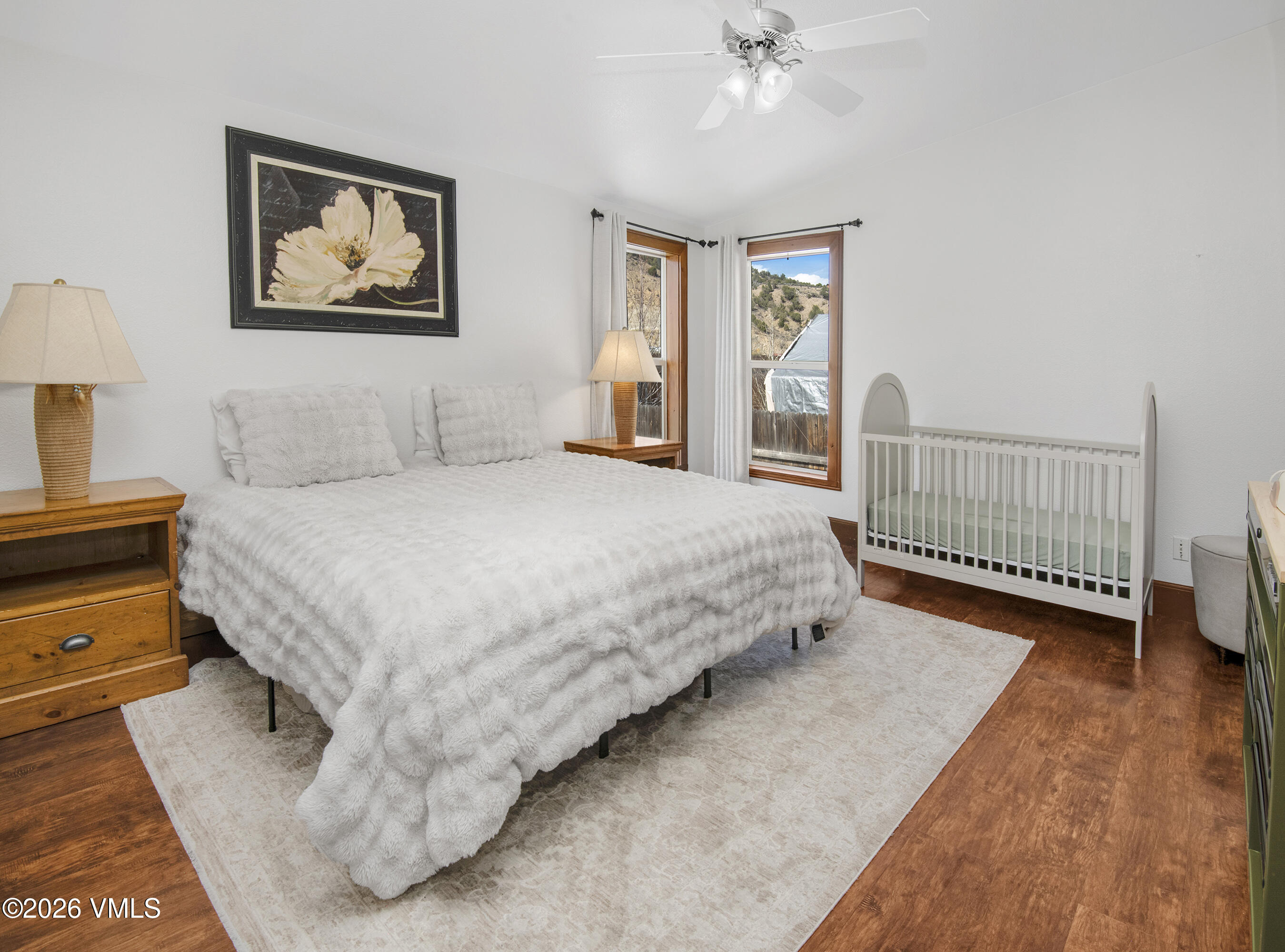 102 Cut Throat Loop Gypsum, CO 81637 - Photo 12 of 37 a bedroom with a bed and a painting on the wall