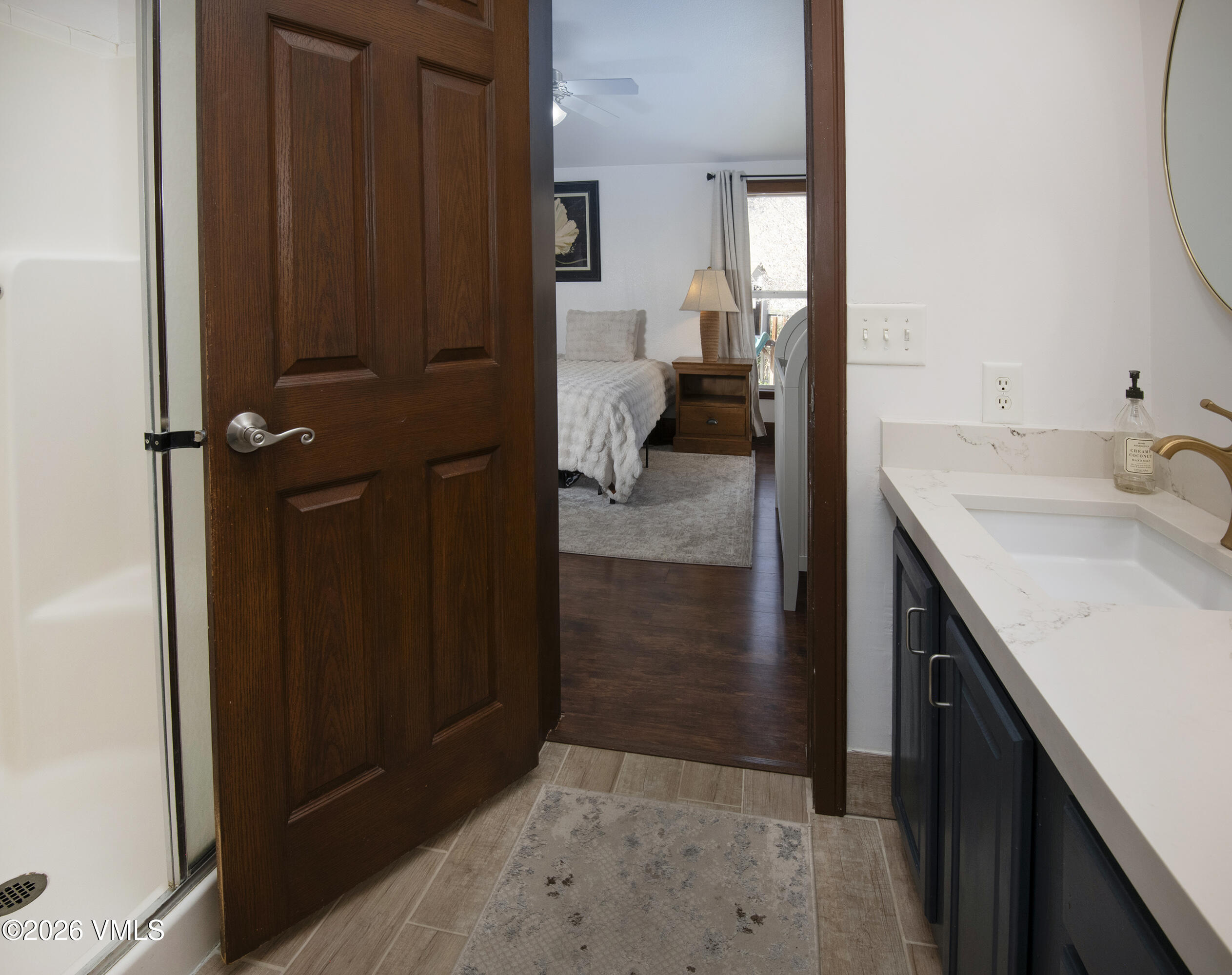 102 Cut Throat Loop Gypsum, CO 81637 - Photo 14 of 37 a bathroom with a sink and a mirror