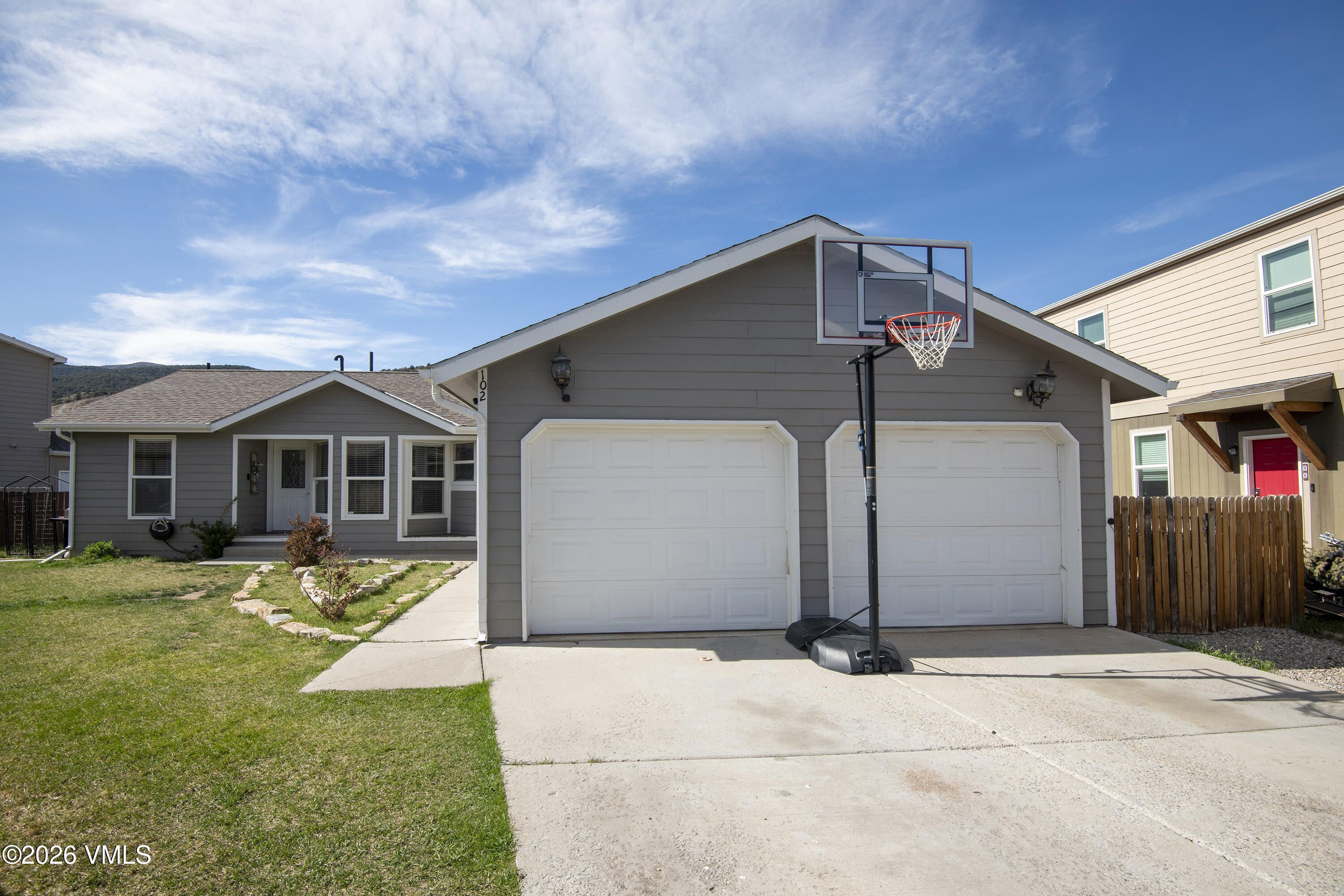 102 Cut Throat Loop Gypsum, CO 81637 - Photo 2 of 37 a front view of a house with a yard