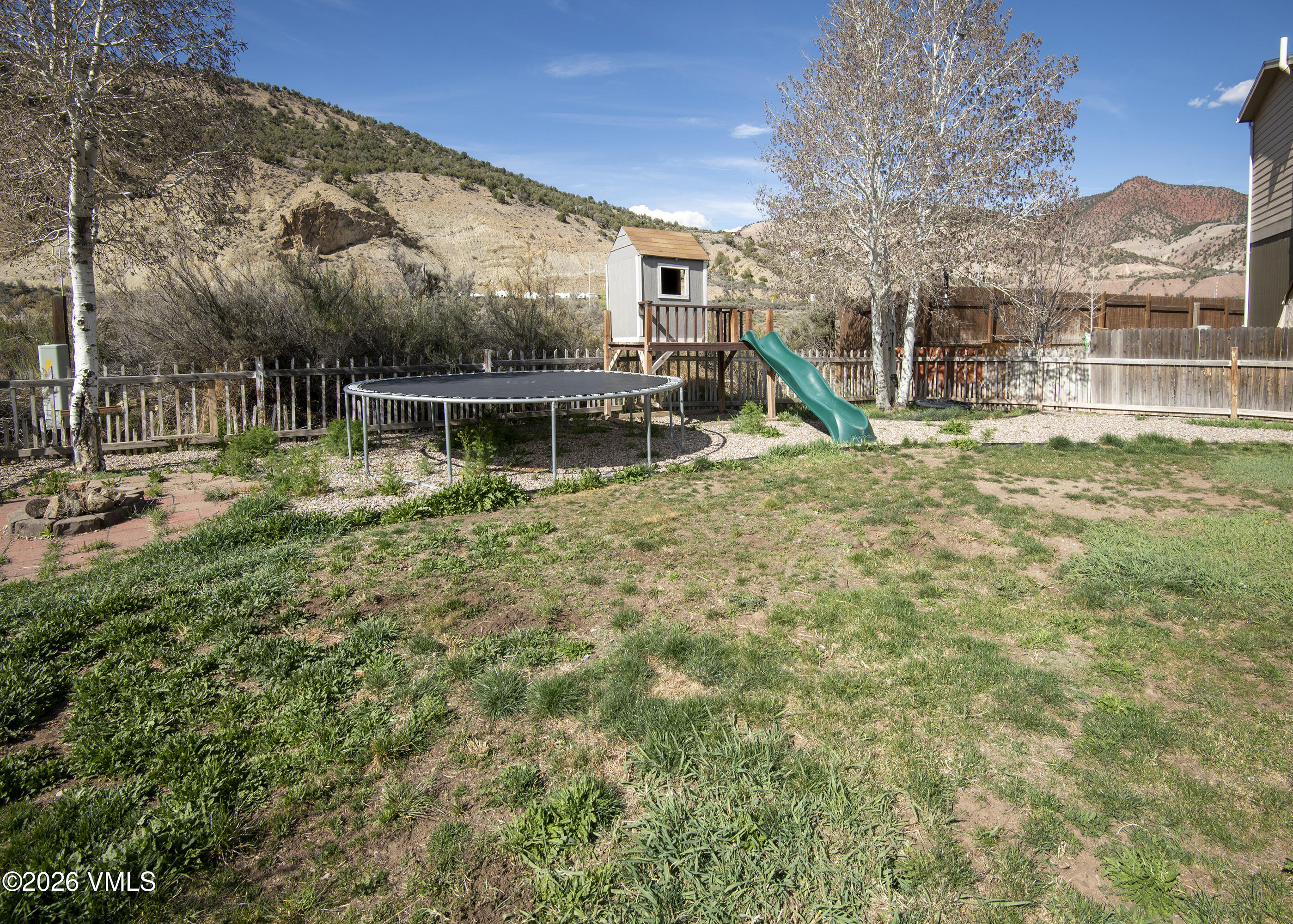 102 Cut Throat Loop Gypsum, CO 81637 - Photo 25 of 37 a view of a house with a yard