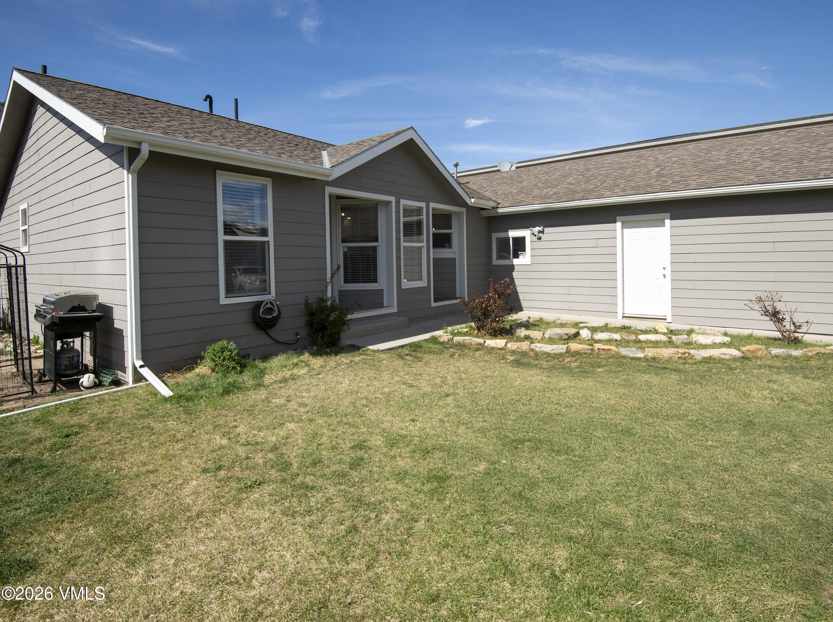 102 Cut Throat Loop Gypsum, CO 81637 - Photo 26 of 37 a view of a house with yard and sitting area