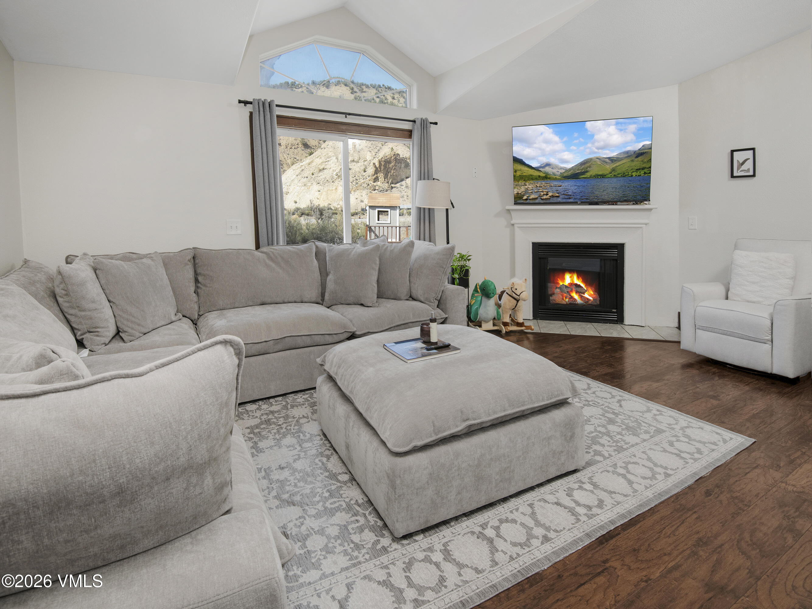 102 Cut Throat Loop Gypsum, CO 81637 - Photo 9 of 37 a living room with furniture and a fireplace