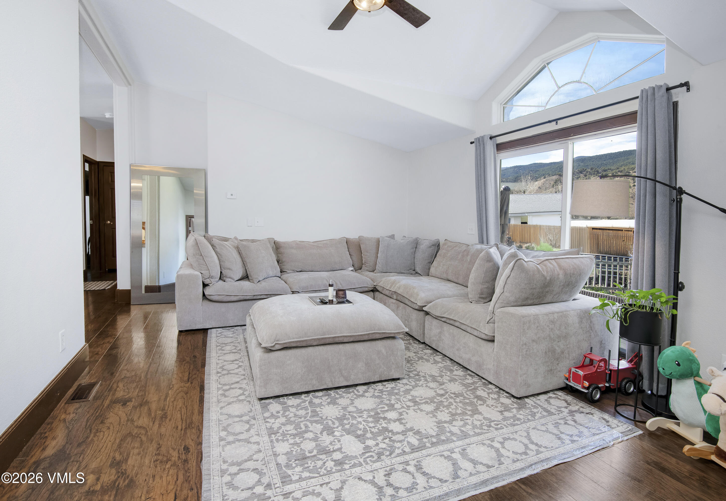 102 Cut Throat Loop Gypsum, CO 81637 - Photo 10 of 37 a living room with furniture potted plant and a window