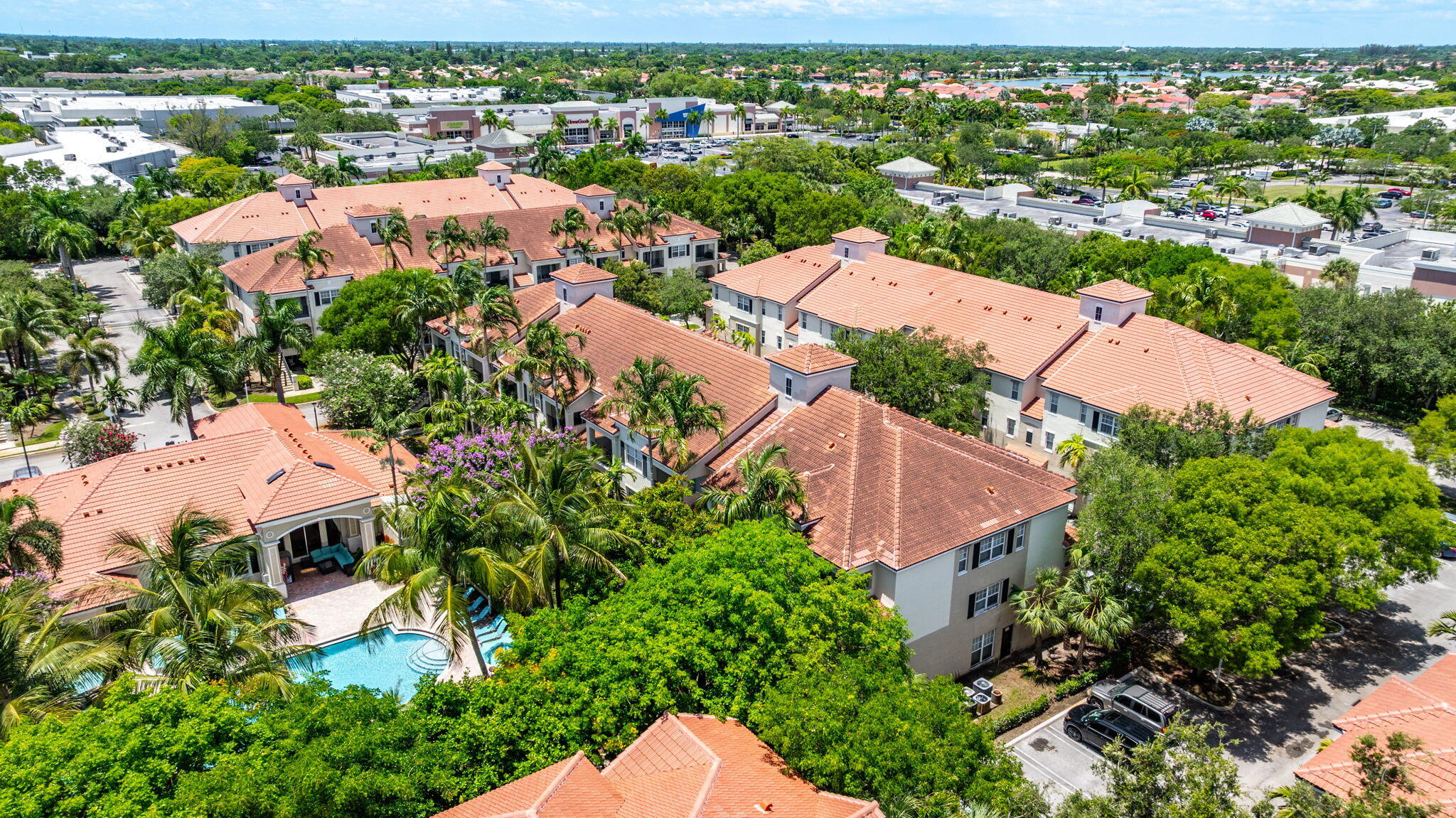 5860 West Sample Road, Unit 202 Coral Springs, FL 33067 - Photo 18 of 26 an aerial view of residential houses with outdoor space and street view