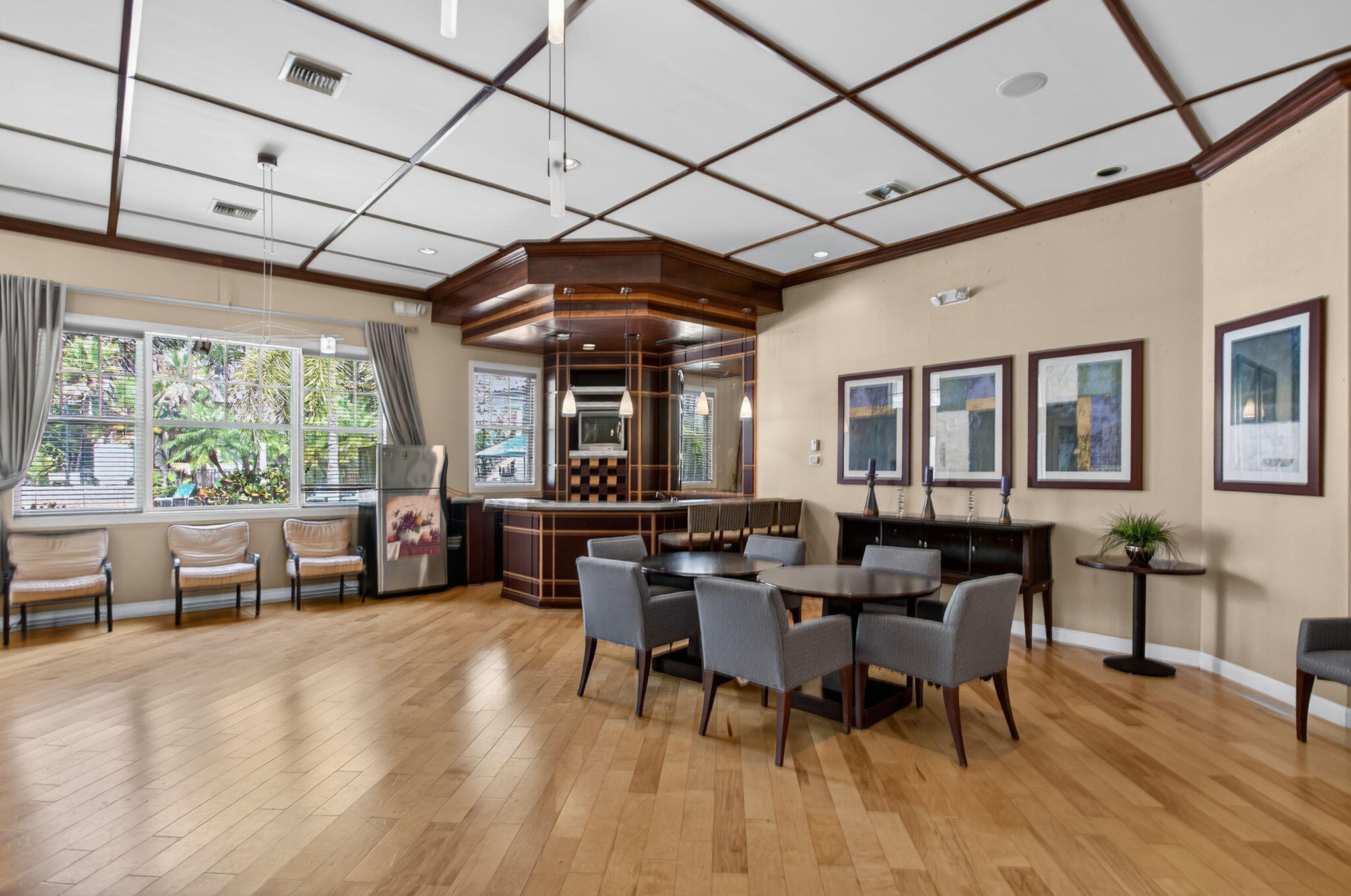 5860 West Sample Road, Unit 202 Coral Springs, FL 33067 - Photo 23 of 26 a view of a dining room with furniture window and outside view