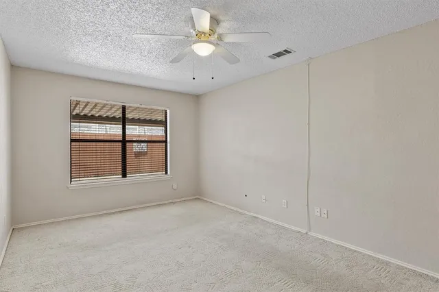 a bathroom with a sink toilet a mirror and shower