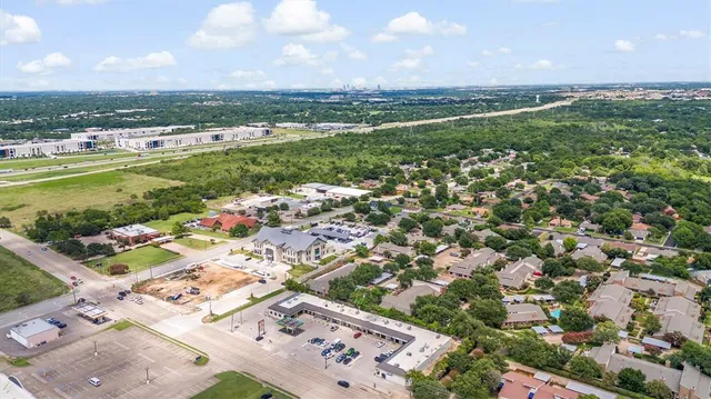 a picture of a building with a white wall