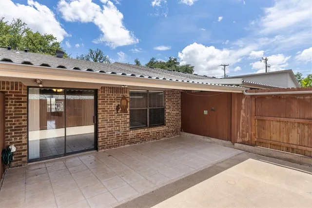 a view of a porch with a refrigerator