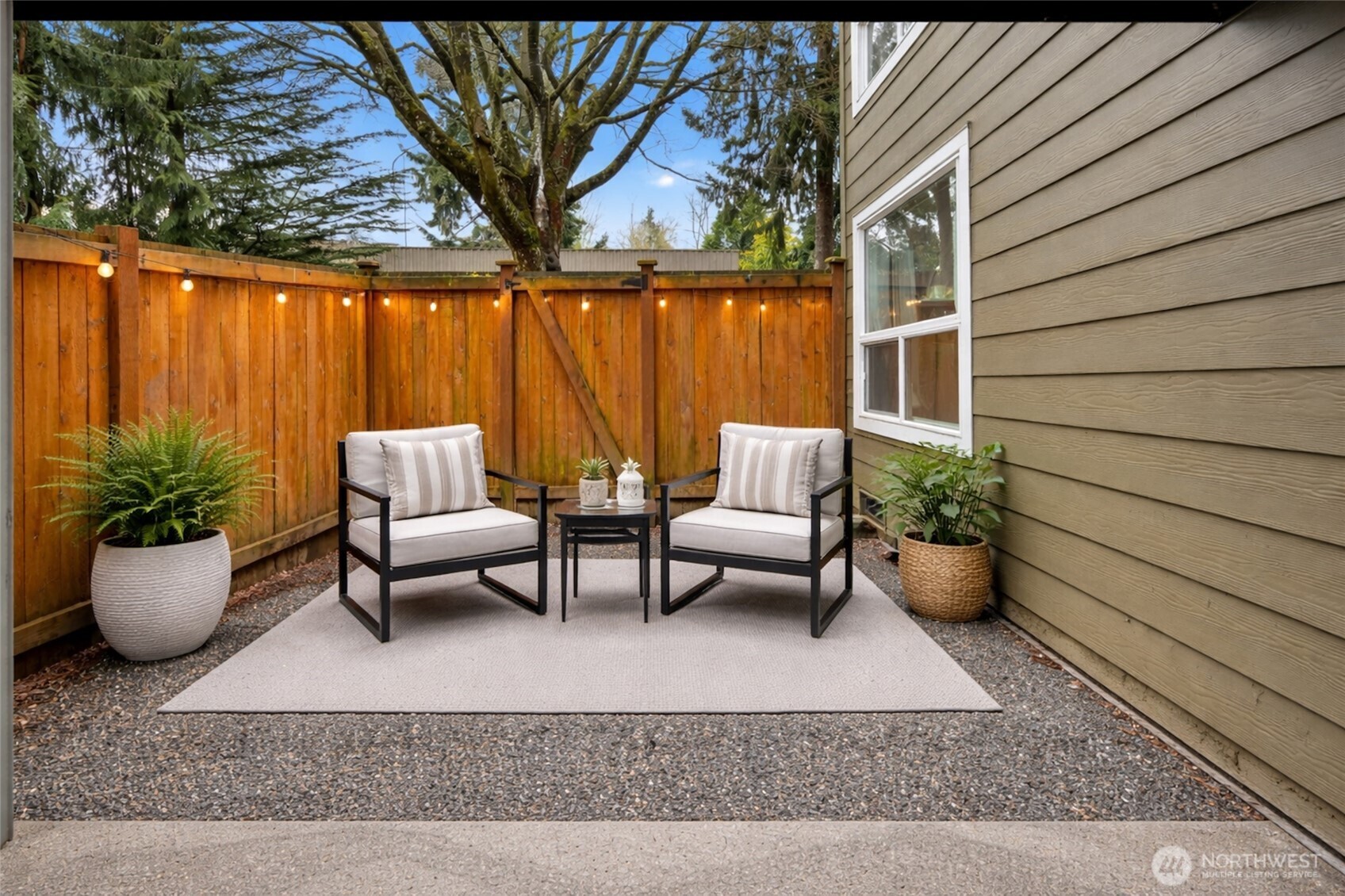 820 Cady Road, Unit H101 Everett, WA 98203 - Photo 17 of 31 a view of a patio with couches and potted plants