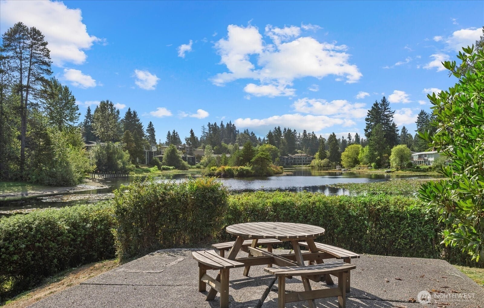 820 Cady Road, Unit H101 Everett, WA 98203 - Photo 21 of 31 a view of a lake with a yard