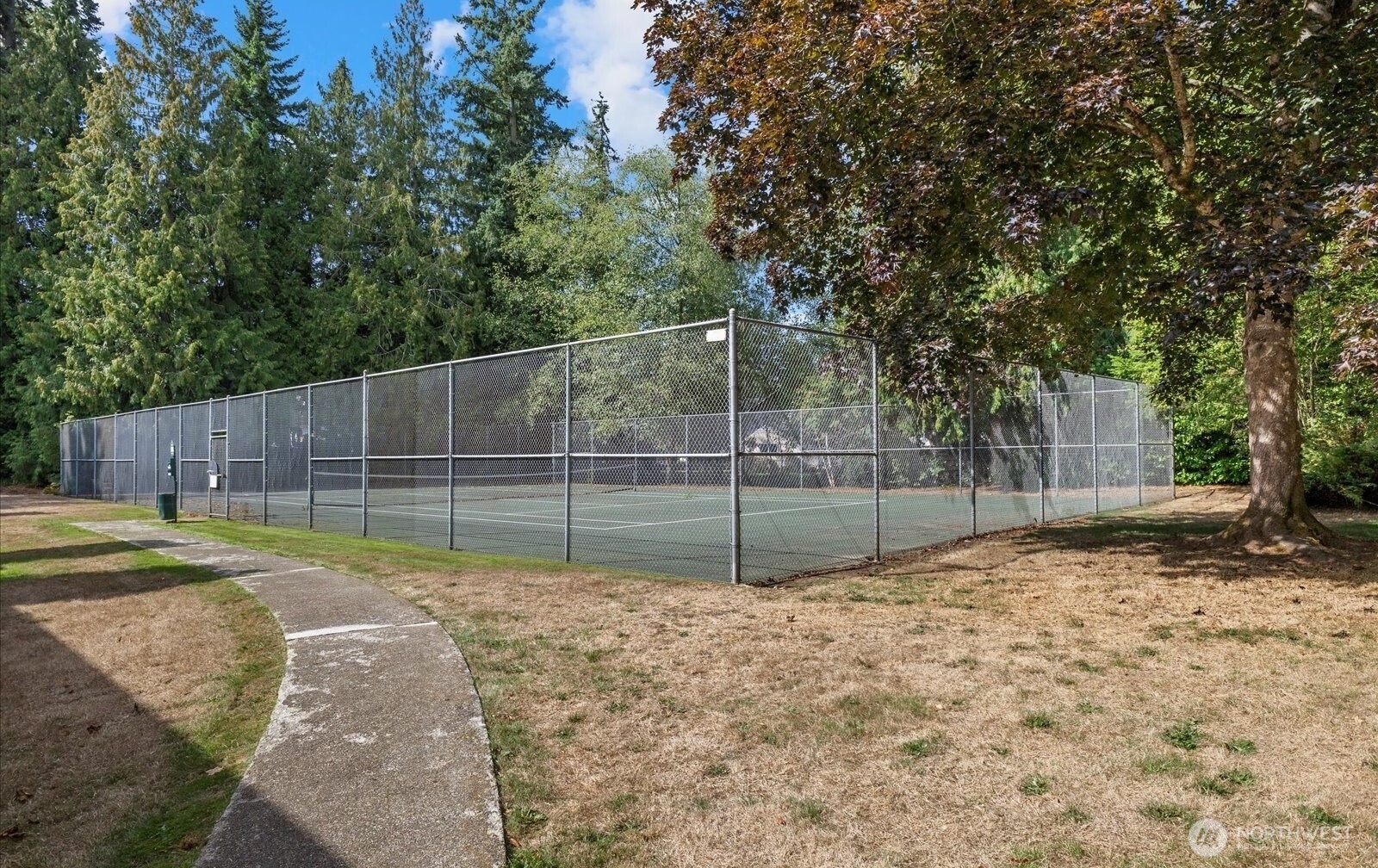 820 Cady Road, Unit H101 Everett, WA 98203 - Photo 25 of 31 a view of a backyard with of swings