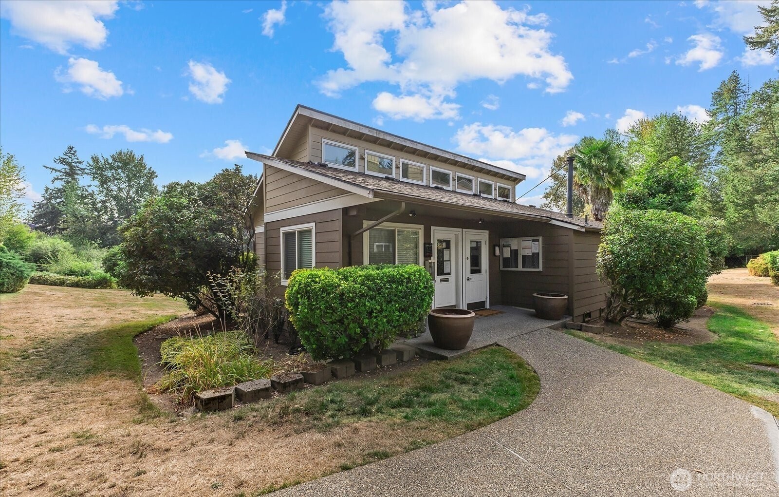 820 Cady Road, Unit H101 Everett, WA 98203 - Photo 27 of 31 a view of a house with a yard and sitting area