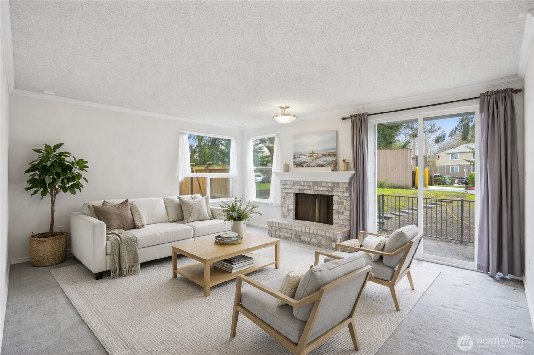 820 Cady Road, Unit H101 Everett, WA 98203 - Photo 3 of 31 a living room with furniture fireplace and a large window