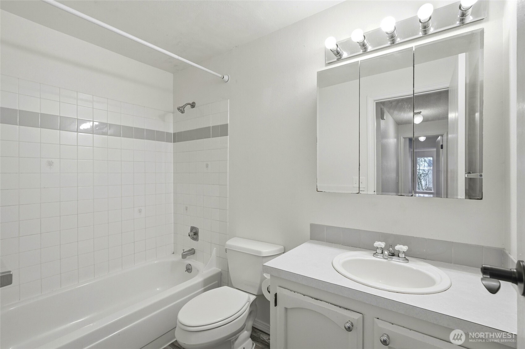 820 Cady Road, Unit H101 Everett, WA 98203 - Photo 10 of 31 a bathroom with a sink a toilet and shower