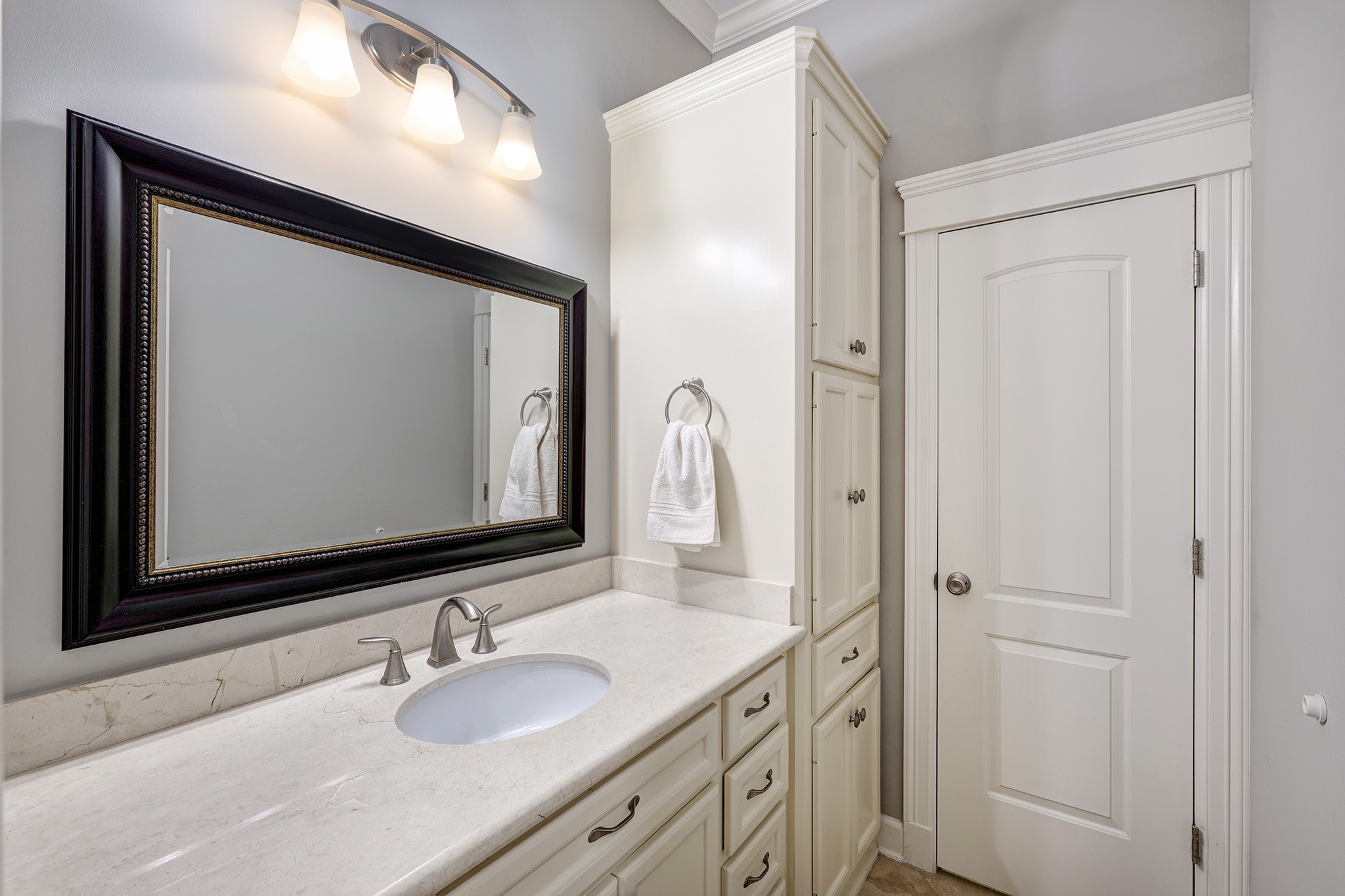 1010 Nicholson Street Houston, TX 77008 - Photo 22 of 28 a bathroom with a granite countertop sink vanity and mirror