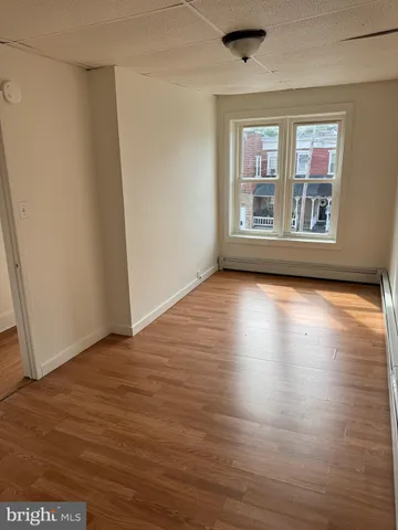 a view of livingroom with hardwood floor and window