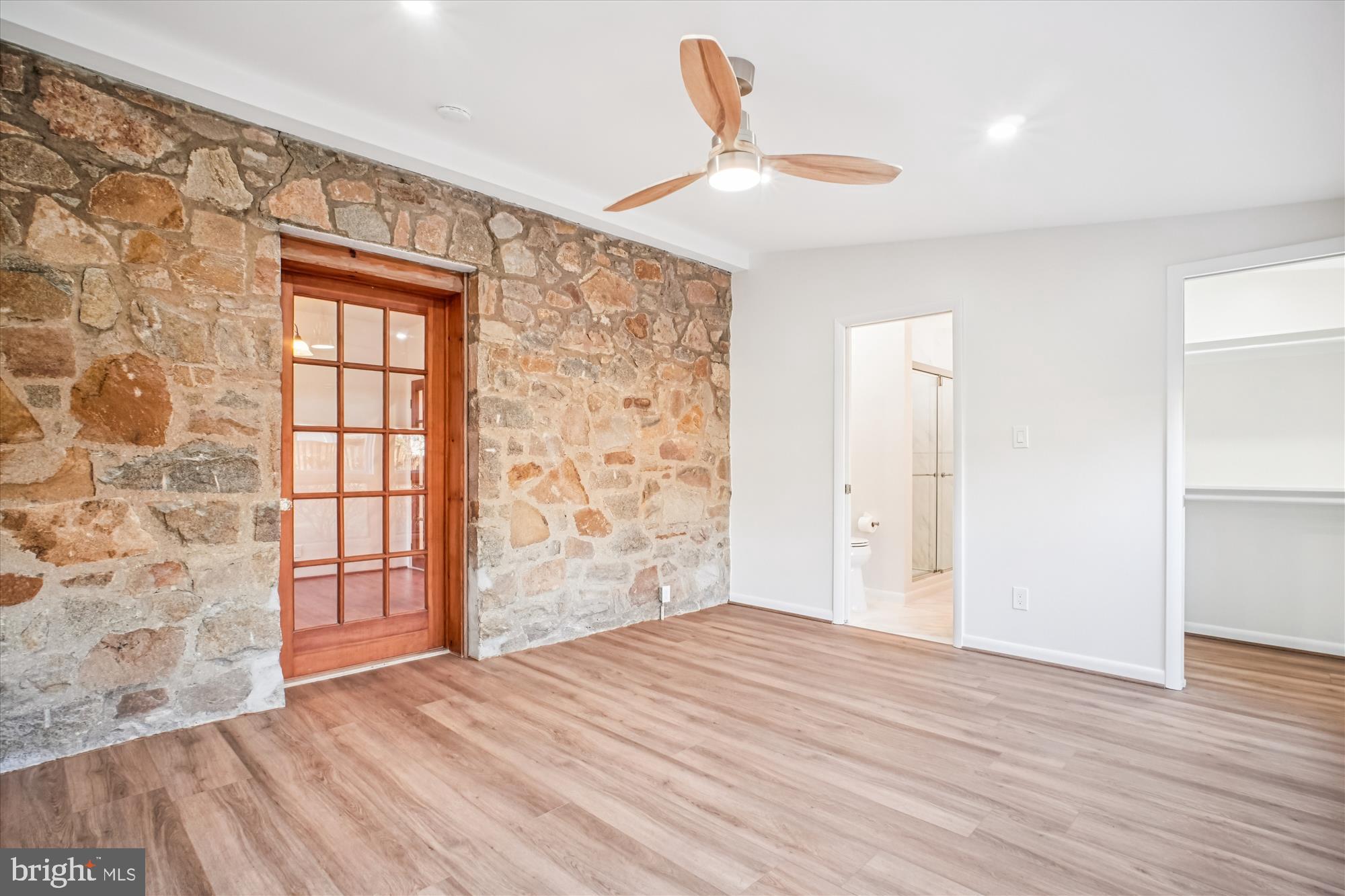 6022 Valley View Drive Alexandria, VA 22310 - Photo 13 of 50 a view of empty room with wooden floor and fan