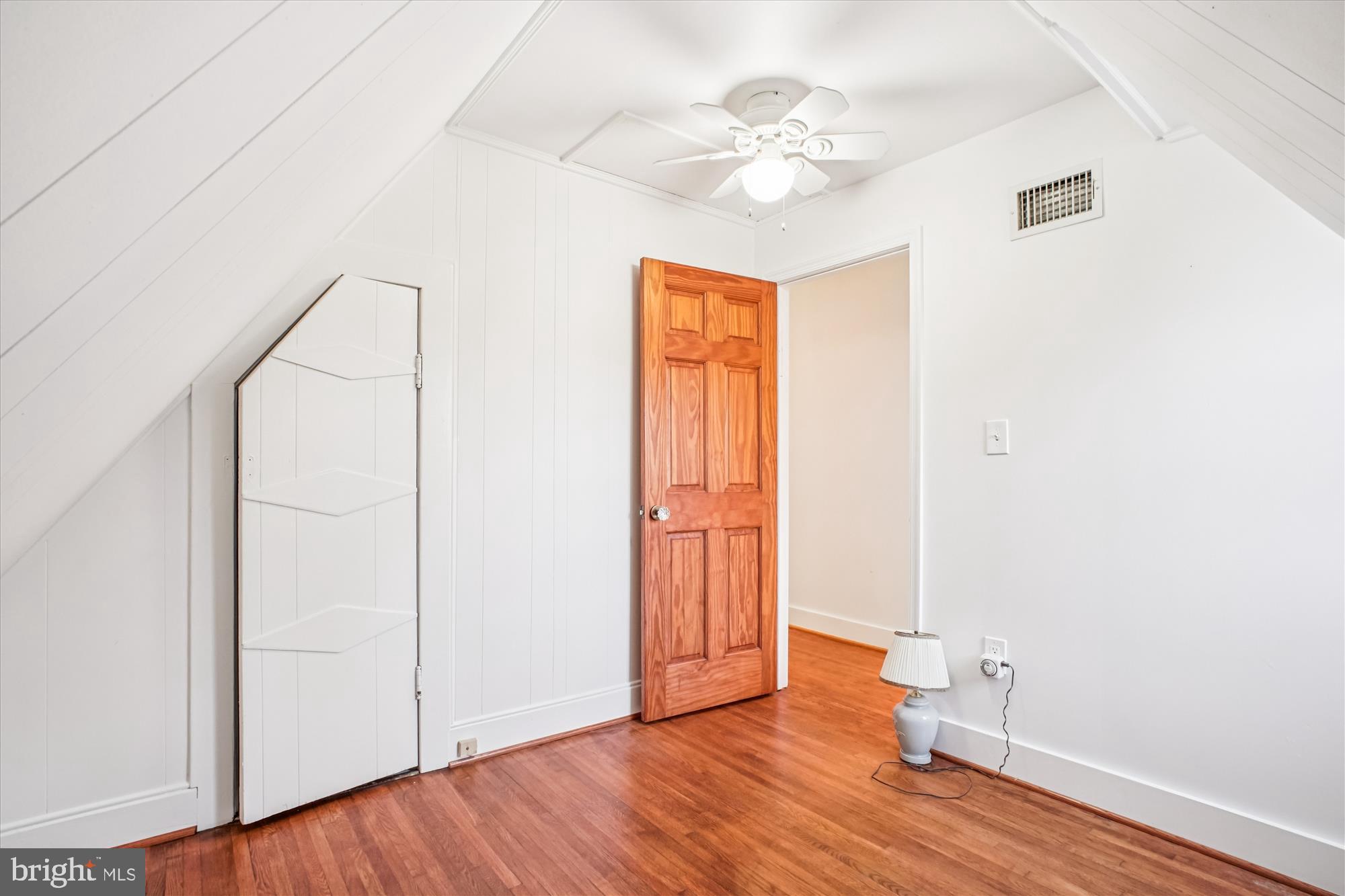 6022 Valley View Drive Alexandria, VA 22310 - Photo 16 of 50 an empty room with wooden floor and fan