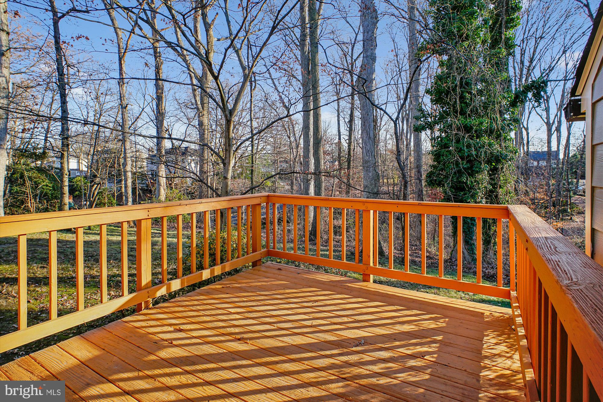 6022 Valley View Drive Alexandria, VA 22310 - Photo 27 of 50 a balcony with wooden floor and fence
