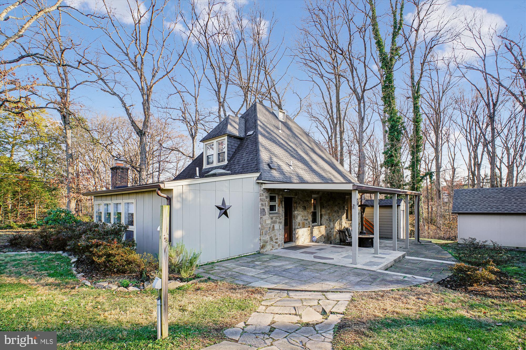 6022 Valley View Drive Alexandria, VA 22310 - Photo 30 of 50 a view of a white house with a large tree