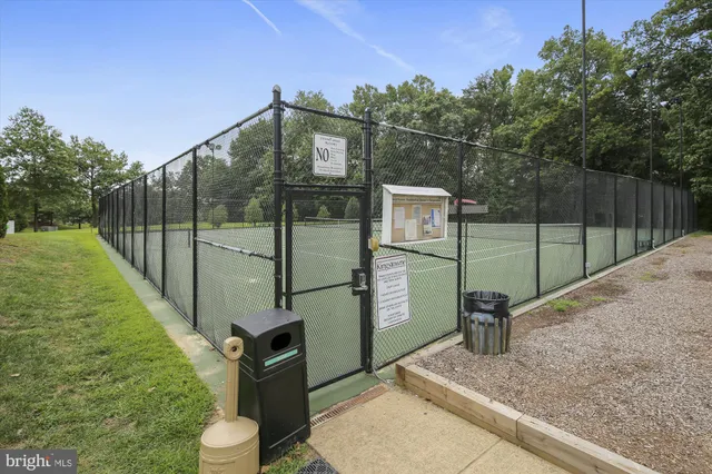 a view of outdoor space with playground and green space